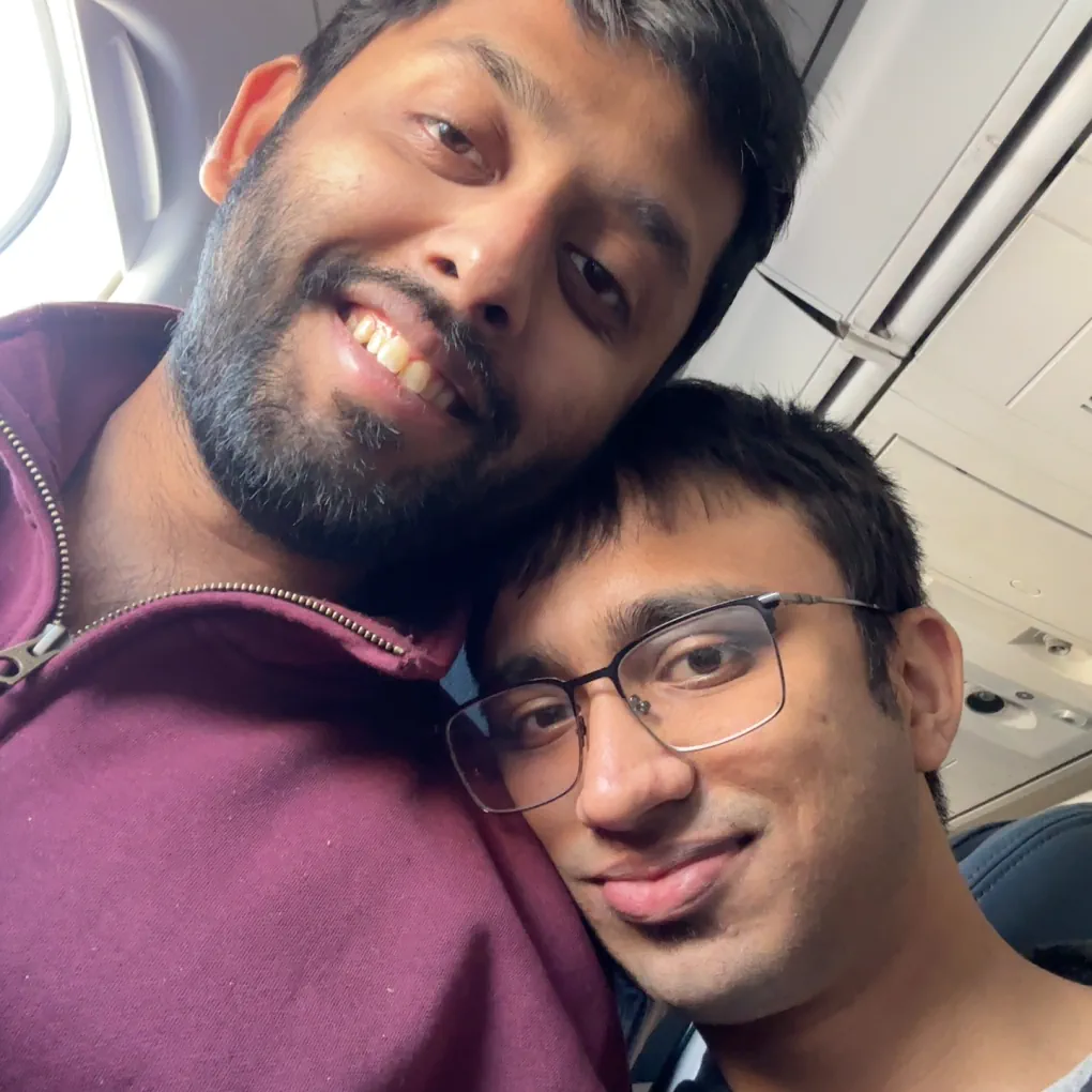 The two of us on a plane, leaning into each other.